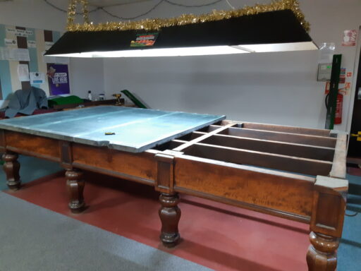 Partially dismantled snooker table